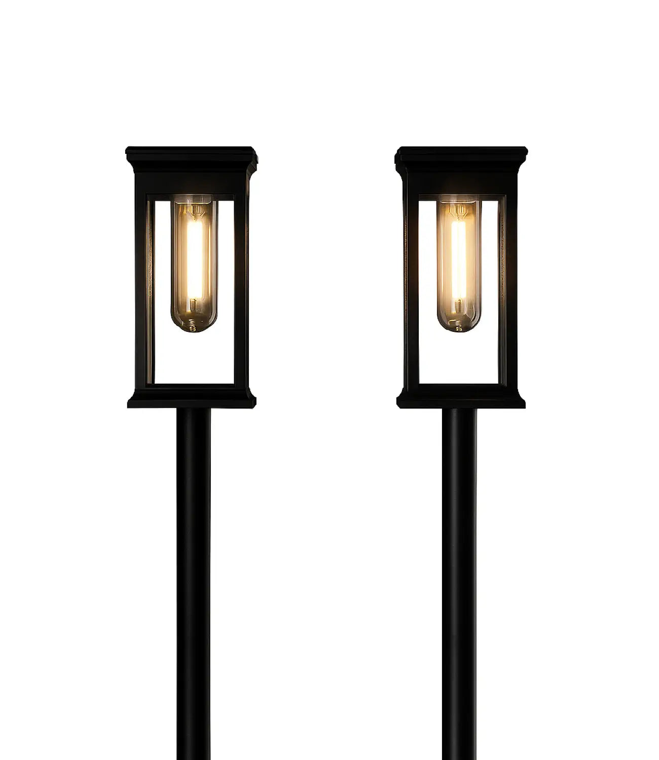 two black post lantern garden lights illuminated against a plain white background.