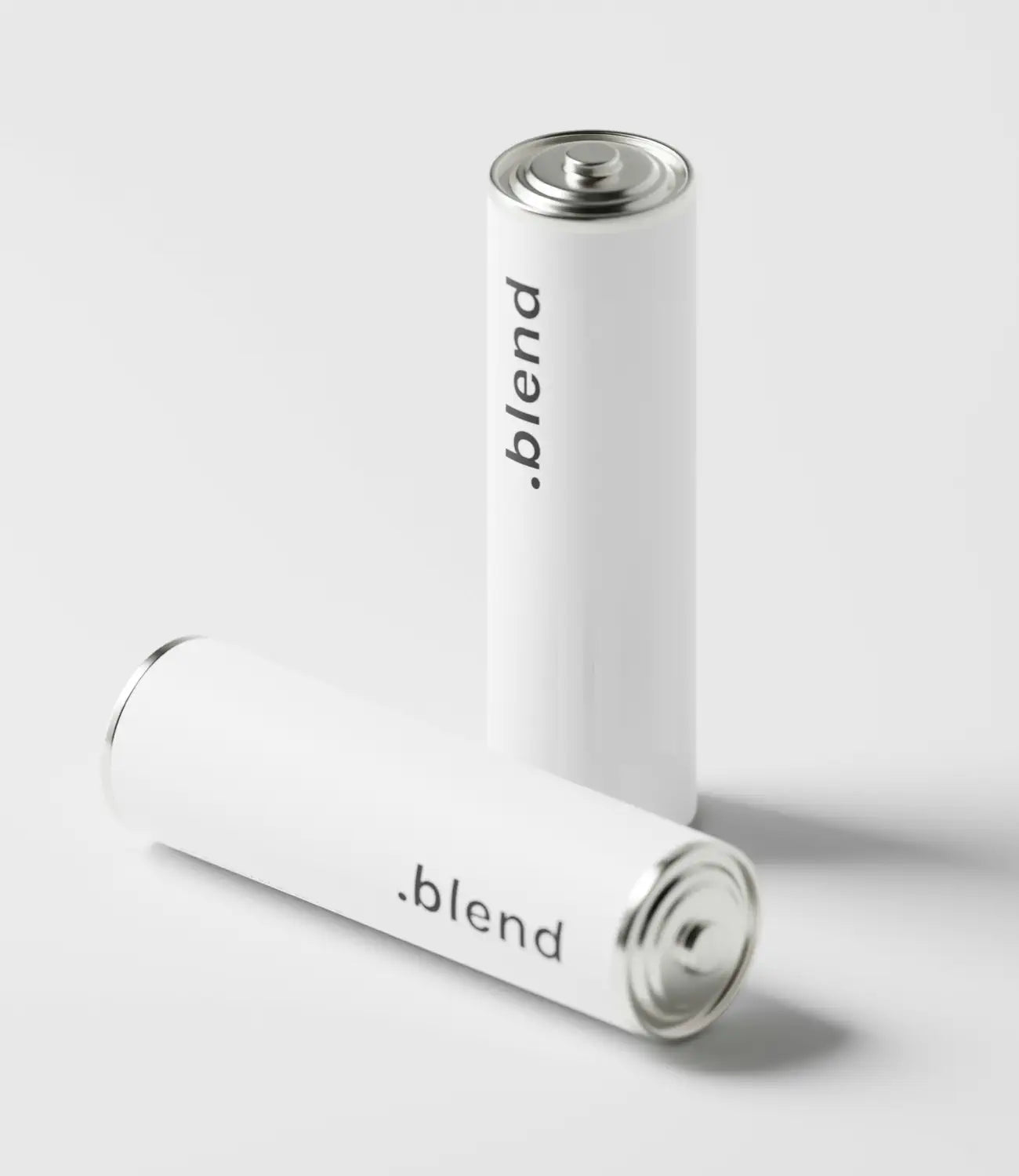 Two white cylindrical batteries with metallic ends, branded with the word “blend”.